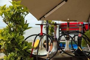 Kaljano rūkymas lauke: privalumai, trūkumai